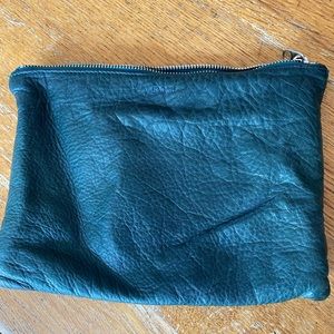Small dark green leather Baggu clutch